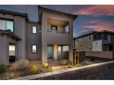 Charming two-story home features a private balcony and manicured front yard at 500 Pear Lake St, Las Vegas, NV 89138