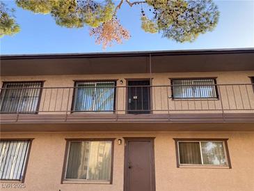 A charming apartment complex featuring a secure, gated balcony for added peace of mind at 575 S Royal Crest Cir # 13, Las Vegas, NV 89169