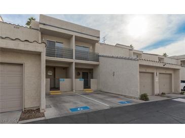 Inviting condo featuring private parking, garages, and balconies for comfortable living at 6250 W Flamingo Rd # 7, Las Vegas, NV 89103