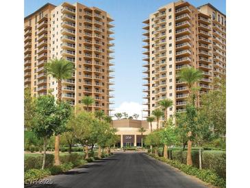 Luxurious high-rise condo with beautifully landscaped entrance and palm tree lined drive at 8255 Las Vegas Blvd # 415, Las Vegas, NV 89123