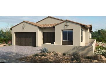 Charming single-story home with desert landscaping, attached two-car garage and tile roof at 258 Paraggi Bay Dr, Henderson, NV 89011