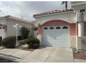 Charming single-story home features a well-maintained front yard and a one-car garage at 5185 Briar Meadow Way, Las Vegas, NV 89118