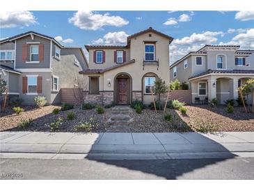 Charming two-story home featuring desert landscaping and neutral color palette at 3757 Via Gennaro, Henderson, NV 89044