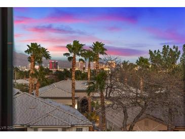 Beautiful view featuring palm trees and rooftops, capturing the essence of luxury living and neighborhood charm at 4288 Veraz St, Las Vegas, NV 89135