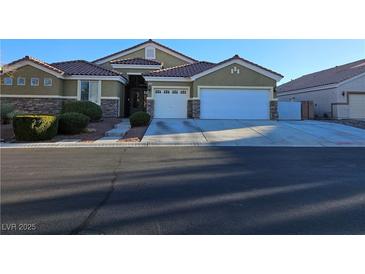 Charming single-story home with a two-car garage and a beautifully landscaped front yard at 8301 Mooses Ct, Las Vegas, NV 89131