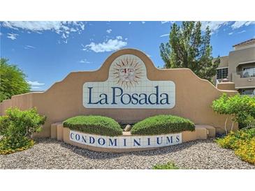 Welcoming La Posada Condominiums sign with lovely landscaping and desert plants at 1908 Tierra Vista Dr # 206, Las Vegas, NV 89128