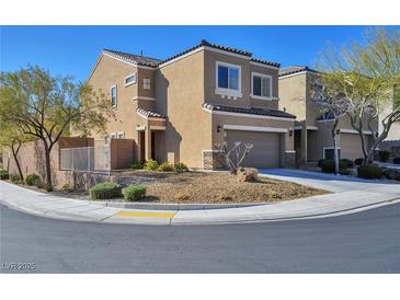 Charming two-story home featuring desert landscaping and an attached two-car garage at 8429 Spirit Vale Ave, Las Vegas, NV 89117