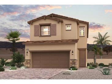 Charming two-story home boasting a neutral stucco finish, a two-car garage, and desert landscaping at 879 Pointe Arbor St, Henderson, NV 89011