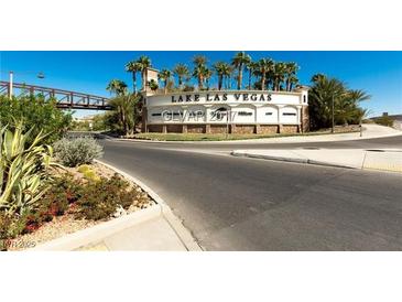 Lake Las Vegas entrance with desert landscaping and a pedestrian bridge overhead at 2 Camino Barcelona Pl, Henderson, NV 89011