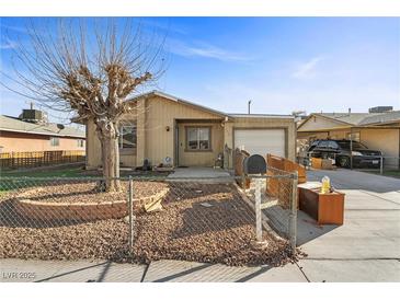 Charming single-story home with a well-maintained front yard and covered parking at 4432 Ash Ave, Las Vegas, NV 89110