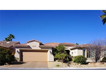 Charming single-story home with a well-maintained front yard and desert landscaping at 5059 Pensier St, Las Vegas, NV 89135