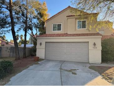 Charming two-story home featuring a two-car garage and well-maintained landscaping at 7509 Wheat Grass Ct, Las Vegas, NV 89129