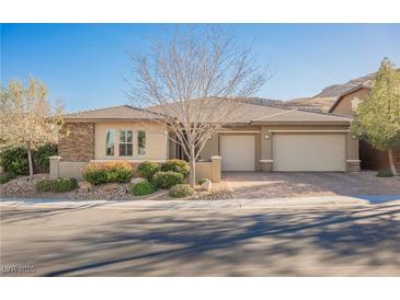 Charming single-story home with a two-car garage, mature landscaping, and a well-maintained front yard at 10507 Bryn Haven Ave, Las Vegas, NV 89135