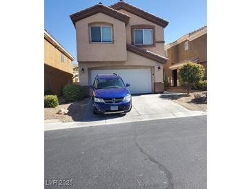 Two-story home featuring a neutral color scheme, attached garage, well-manicured landscaping, and a paved driveway at 280 Broken Par Dr, Las Vegas, NV 89148
