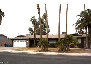 Charming single-story home with desert landscaping and a two-car garage at 4536 E Baltimore Ave, Las Vegas, NV 89104