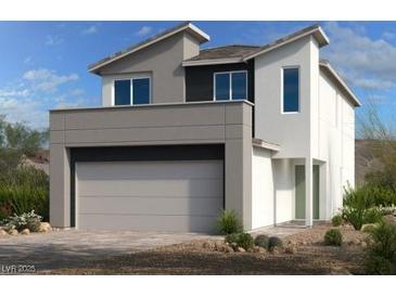 Modern two-story home with a two-car garage and contemporary architectural details, complemented by desert landscaping at 10012 River Corral St, Las Vegas, NV 89166