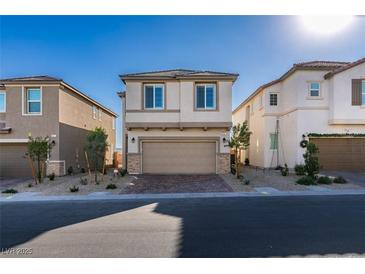 Charming two-story home boasting a well-manicured front yard, a two-car garage, and appealing architectural details at 3921 Painted Lady Ave, Las Vegas, NV 89141