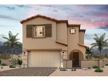 Charming two-story home with a tile roof, two car garage, and landscaped front yard, in a desert setting at 10583 Valletta Ave, Las Vegas, NV 89166