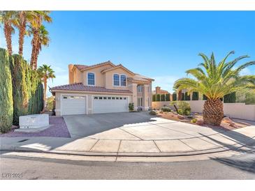 Charming home with a spacious three-car garage and desert landscaping at 3658 Ambergate Ct, Las Vegas, NV 89147