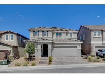 Beautiful two-story home with a two car garage, appealing to buyers at 3524 Crotone Ave, Henderson, NV 89044