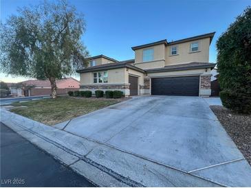 Charming two-story home featuring a spacious driveway and well-manicured lawn at 10105 Prattville Ave, Las Vegas, NV 89148