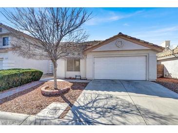 Charming single-story home featuring a well-maintained front yard and an attached two-car garage at 3505 Tuscany Village Dr, Las Vegas, NV 89129