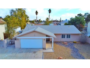 Charming single-story home with well-maintained landscaping and attached two-car garage at 3630 Willow Springs Dr, Las Vegas, NV 89103