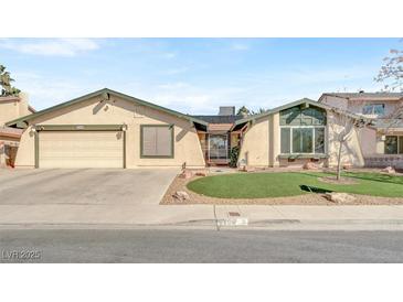 Charming single-story home featuring a two-car garage and well-manicured front yard at 5200 Valley Glen St, Las Vegas, NV 89119