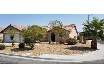 Charming single-story home featuring desert landscaping and a tile roof at , Las Vegas, NV 89118