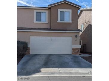 Charming two-story home with a two-car garage and driveway at 3681 Hidden Beach Ct, Las Vegas, NV 89115