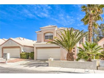 Charming two-story home with a well-manicured yard and a two-car garage in a sunny location at 2340 Hunt Club St, Las Vegas, NV 89128