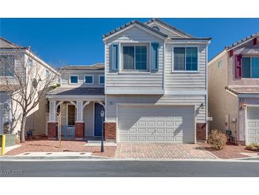 Charming two-story home with a well-manicured lawn and a two-car garage at 7978 Light Tower St, Las Vegas, NV 89139