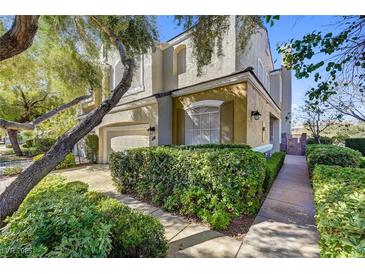 Charming two-story home with well-manicured landscaping and a two car garage at 917 Collingtree St, Las Vegas, NV 89145