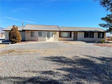 Charming single-story home with gravel landscaping and desert surroundings, perfect for low-maintenance living at 1681 Appaloosa Ln, Pahrump, NV 89060