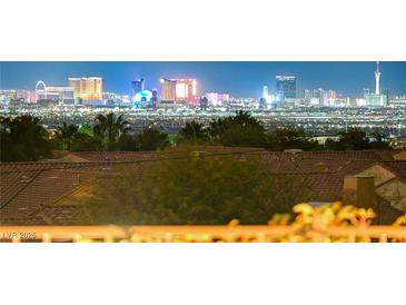 Panoramic city view featuring bright lights and the city skyline from an elevated point of view at 2503 Kaymin Ridge Rd, Henderson, NV 89052