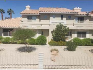 Charming two-story home with desert landscaping and a red tile roof at 2200 Highpointe Dr # 201, Laughlin, NV 89029