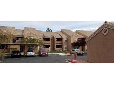 Apartment complex with well-maintained landscaping, covered parking, and neutral-toned exterior paint at 8101 W Flamingo Rd # 1073, Las Vegas, NV 89147