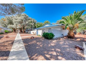 Charming single story home in a quiet neighborhood with desert landscaping and sidewalk at 2109 Willowbury Dr # C, Las Vegas, NV 89108