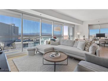 Bright living room boasts city views, modern furnishings and comfortable seating arrangements at 2700 Las Vegas Blvd # 1202, Las Vegas, NV 89109
