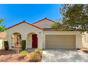 Charming single-story home with desert landscaping, tile roof, and covered porch at 280 Pear Meadow St, Henderson, NV 89012