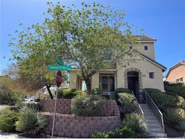 Charming two-story home featuring a landscaped front yard and inviting entrance at 2461 Brooklyn Bridge St, Las Vegas, NV 89135