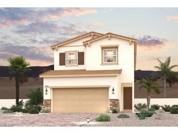 Charming two-story home featuring a two-car garage, neutral stucco siding, complemented by stone accents and desert landscaping at 240 Kobuk Ave, Henderson, NV 89011