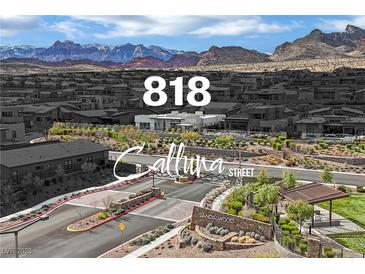 Welcoming entrance to Callura Street, featuring desert landscaping, and mountain views in the background at 818 Calluna St, Las Vegas, NV 89138