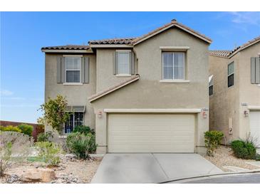 Charming two-story home featuring a two-car garage and low-maintenance landscaping at 4977 Vacaville Ave, Las Vegas, NV 89139