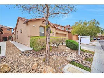 Charming single-Gathering home with desert landscaping and a well-maintained lawn at 7317 Caballo Range Ave, Las Vegas, NV 89179