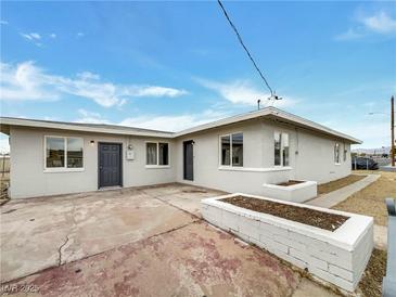 Charming single-story home featuring neutral paint and a spacious front yard with potential for landscaping at 1200 Cunningham Dr, Las Vegas, NV 89106