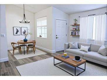 Cozy living room featuring modern furnishings and ample natural light at 1624 N Torrey Pines Dr # 101, Las Vegas, NV 89108