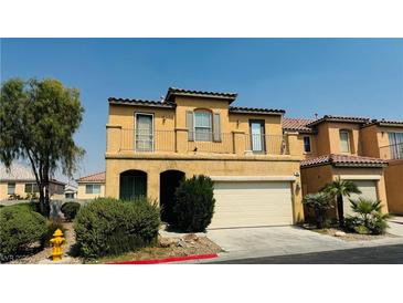 Inviting two-story home featuring a neutral color palette, low maintenance landscaping and an attached two car garage at 836 Sheerwater Ave, Henderson, NV 89052