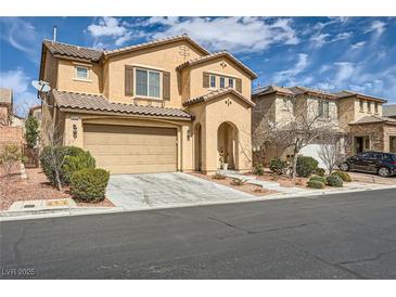 Charming two-story home with a well-maintained lawn and a two-car garage at 10316 Northern Hills Ave, Las Vegas, NV 89166