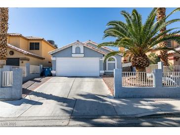 Charming single-story home with desert landscaping, a two-car garage, and a well-maintained front yard at 5309 Silverheart Ave, Las Vegas, NV 89142